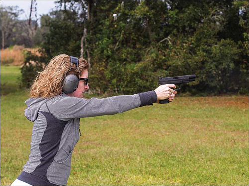 Woman Shooting 10mm Pistol