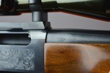 Remington 7400 270 Deluxe Engraved with Leupold Rings & Bases along with Bushnell 4-12x40 AO scope - 14 of 19