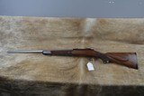 Cooper Model 21 223 Rem Very Early Model Serial # A34 Sporter style stock with shadow line cheek piece, pointed fleur de lis checkering, 24