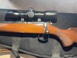 Left Hand CZ 452 American .22 rifle w/ 6x Primary Arms scope & accessories - 2 of 10