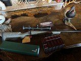 Cooper Model 52 Excalibur 338-06 w/Swarovski/Ammo - 1 of 4