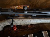 Cooper (Montana) model 52 Excalibur 6.5-284 with Swarovski and Ammo - 2 of 5