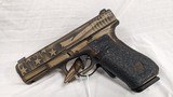 USED GLOCK 45 BRONZE FLAG 9MM - 1 of 2