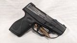 USED TAURUS PT709 SLIM 9MM - 1 of 2