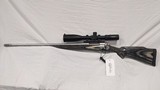 USED REMINGTON 700 LEFT HAND W/ QUIGLEY FORD SCOPE 7MM REM MAG
