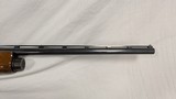 USED REMINGTON 1100 FIELD 26