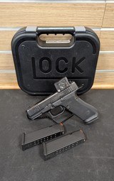 GLOCK 45 GEN. 6 - AIMPOINT COA - 9MM - BLUE LABEL - Image 1 of 1