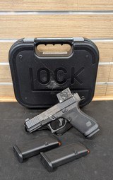 GLOCK 19 GEN. 6 - AIMPOINT COA - 9MM - BLUE LABEL - Image 1 of 1