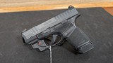 USED SPRINGFIELD ARMORY HELLCAT OSP 9MM W/ LASER - Image 1 of 3