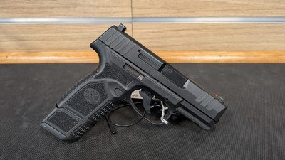 USED FN REFLEX 9MM - Image 1 of 2