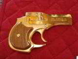 HIGH STANDARD DERRINGER 22 MAGNUM [FACTORY GOLD PLATED] UNFIRED 100% COND. SERIAL #GP0294 - 1 of 2