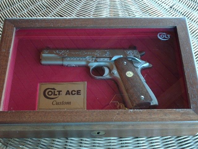 COLT ACE 22 CAL.ELECTROLESS NICKEL, FACTORY ENGRAVED, IN COLT FACTORY CASE WITH 