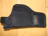 UNCLE MIKE'S "SIDE KICK" SIZE 1, BLACK NYLON BELT HOLSTER, FITS SMALL TO MED. SIZE SEMI-AUTO'S, LIKE NEW - 2 of 2