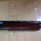 REMINGTON 1100, 12 GA. HIGH GLOSS WALNUT WITH WHITE DIAMOND IN PISTOL GRIP CAP, CHOICE OF 26" IC, VR. OR 28"
MOD., VENT RIB, 99%
COND. - 6 of 6