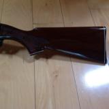 REMINGTON 1100, 12 GA. HIGH GLOSS WALNUT WITH WHITE DIAMOND IN PISTOL GRIP CAP, CHOICE OF 26" IC, VR. OR 28"
MOD., VENT RIB, 99%
COND. - 3 of 6
