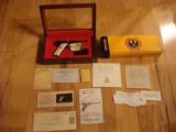 RUGER MARK 2, 22 LR. 40TH ANNIVERSARY, 24 CARET GOLD ENGRAVED, #7 MEMBER OF THE U.S. HISTORICAL FOUNDATION [SOLD PENDING FUNDS]
- 1 of 3