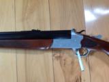 SAVAGE 24 DELUXE, 22 LR. OVER 410 GA.,SIDE BUTTON BARREL SELECTOR MODEL, SATIN SILVER ENGRAVED RECEIVER, GOLD TRIGGER, EXC. COND. [SOLD PENDING FUNDS] - 6 of 7