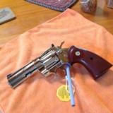 COLT PYTHON 357 MAG. 4" BRITE NICKEL, MFG. 1970, UNFIRED, UNTURNED 100% COND. IN 2 PIECE BOX {SOLD PENDING FUNDS]
- 3 of 4