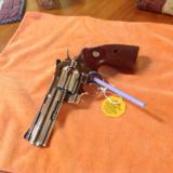 COLT PYTHON 357 MAG. 4" BRITE NICKEL, MFG. 1970, UNFIRED, UNTURNED 100% COND. IN 2 PIECE BOX {SOLD PENDING FUNDS]
- 4 of 4