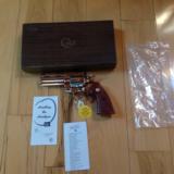 COLT PYTHON 357 MAG. 4" BRITE NICKEL, MFG. 1970, UNFIRED, UNTURNED 100% COND. IN 2 PIECE BOX {SOLD PENDING FUNDS]
- 1 of 4