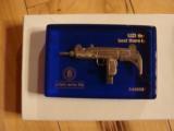 UZI #7 OF 100 ISSUED, AMERICAN HISTORICAL FOUNDATION, MFG. 1987, NICKEL PLATED, HAND ENGRAVED, ALSO 24-KARAT GENUINE GOLD [SOLD PENDING FUNDS]
- 4 of 7