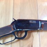 WINCHESTER 9422,
22 LR. HIGH GRADE, 20 1/2" BARREL [RACOON ON ONE SIDE, HOUND DOG ON THE OTHER SIDE], NEW UNFIRED IN BOX - 2 of 10