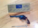 SMITH & WESSON K-22 MASTERPIECE [PRE-17] 22 LR., 6" BLUE IN GOLD BOX, 99% COND. [SOLD PENDING FUNDS] - 1 of 7