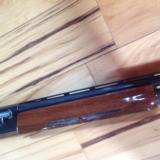 REMINGTON 1100, 16 GA., 26" IMPROVED CYL. VENT RIB, 99% COND. - 8 of 9