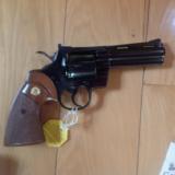 COLT PYTHON 357 MAGNUM 4" BLUE, MFG. 1979, NEW 100% COND., UNFIRED, NO TURN RING, IN THE BOX [SOLD PENDING FUNDS]
- 4 of 5