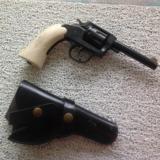 IVER JOHNSON "SEALED EIGHT" 22 LR., WOOD GRIPS HAVE BEEN PAINTED WHITE., COMES WITH BAUER LEATHER HOLSTER - 1 of 4