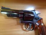SMITH & WESSON 57 NO DASH, 41 MAG. 4" BLUE, APPEARS UNFIRED IN
WOOD S&W PRESENTATION BOX
- 4 of 9