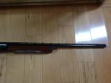 REMINGTON 1100, 16 GA., 28" MOD., VENT RIB, 99% COND. - 2 of 5