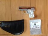 BROWNING BELGIUM "BABY" 25 AUTO, BRITE NICKEL, GOLD TRIGGER, MOTHER OF PEARL GRIPS, 100% COND. UNFIRED, IN ORGINAL ZIPPER POUCH WITH OWNERS
- 1 of 3