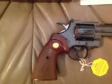 COLT PYTHON 357 MAGNUM, 6" BLUE, MFG. 1976, NEW COND. IN BOX WITH OWNERS MANUAL, HANG TAG, COLT LETTER, ETC.
- 4 of 6