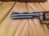 COLT PYTHON 357 MAGNUM, 6" BLUE, MFG. 1976, NEW COND. IN BOX WITH OWNERS MANUAL, HANG TAG, COLT LETTER, ETC.
- 2 of 6