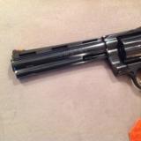 COLT PYTHON 357 MAG. 6" BLUE, LIKE NEW IN BOX WITH OWNERS MANUAL, HANG TAG, COLT LETTER, ETC.
- 6 of 6