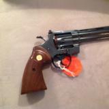COLT PYTHON 357 MAG. 6" BLUE, LIKE NEW IN BOX WITH OWNERS MANUAL, HANG TAG, COLT LETTER, ETC.
- 3 of 6