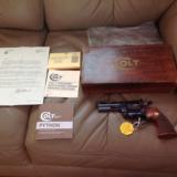 COLT PYTHON 357 MAGNUM 4" BLUE, MFG. 1980, APPEARS UNFIRED WITH NO CYLINDER TURN RING, IN BOX WITH ALL PAPERS - 1 of 11