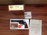 COLT PYTHON 357 MAGNUM, 6" "ROYAL BLUE", NEW UNFIRED, UNTURNED, 100% COND. IN BOX, MFG. 1982
- 1 of 3