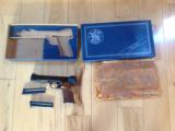 SMITH & WESSON 41, 22 LR. 5 1/2" HEAVY BARREL, 2 MAGAZINES, LIKE NEW IN BOX - 1 of 6