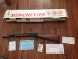 WINCHESTER 94, 32 WIN. CAL., WRANGLER TRAPPER 16" BARREL, LARGE LOOP LEVER, ENGRAVED RECEIVER WITH COWBOY SCENES, NEW UNFIRED,100% COND. IN BOX - 1 of 6