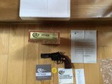 COLT PYTHON 357 MAGNUM, 4" BLUE, MFG. 1978, NEW UNFIRED, UNTURNED 100% COND. IN THE BOX - 1 of 3