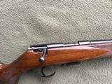 SAVAGE ANSCHUTZ 164 M SPORTER, 22 MAGNUM CAL. 24" BARREL, GROOVED RECEIVER FOR.
SCOPE, MONTE CARLO WALNUT STOCK WITH A FEW HANDLING MARKS, 99% B - 7 of 9