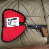 BROWNING BELGIUM HI POWER 9MM, MOST DESIRABLE T-SERIES WITH RING HAMMER, MFG. 1967, 99+% COND. COMES WITH OWNERS MANUAL AND ORIGINAL ZIPPER POUCH - 1 of 4