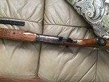 SAVAGE 24V, 222 CAL. OVER 20 GA., WALNUT CHECKERED WOOD, CASE COLORED RECEIVER - 9 of 11