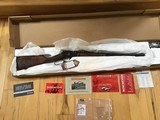 WINCHESTER 9422, 22 LR. HIGH GRADE, TRIBUTE TRADITIONAL, ENGRAVED RECEIVER WITH GOLD HORSE RIDER, NEW UNFIRED 100 % COND. IN BOX WITH RED SLEEVE. - 1 of 8