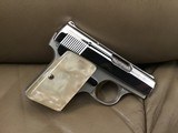 BROWNING BELGIUM "BABY" 25 AUTO, NICKEL WITH GOLD TRIGGER, COMES WITH OWNERS MANUAL, ZIPPER POUCH, EXCELLENT COND. - 2 of 3