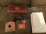 COLT PYTHON 357 MAGNUM, 4” BLUE, MFG. 1975, NEW, UNFIRED, UNTURNED, 100% COND. IN THE BOX - 1 of 7