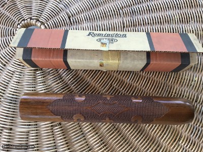 REMINGTON 1100, 20 GA. STANDARD FOREARM, NEW NEVER BEEN ON A GUN, 100% COND. IN REMINGTON DUPONT BOX