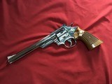 SMITH & WESSON 57 NO DASH, 41 MAGNUM, 8 3/8” NICKEL, NEW UNFIRED IN WOOD PRESENTATION CASE, WITH TOOLS & OWNERS MANUAL, ETC. - 3 of 6